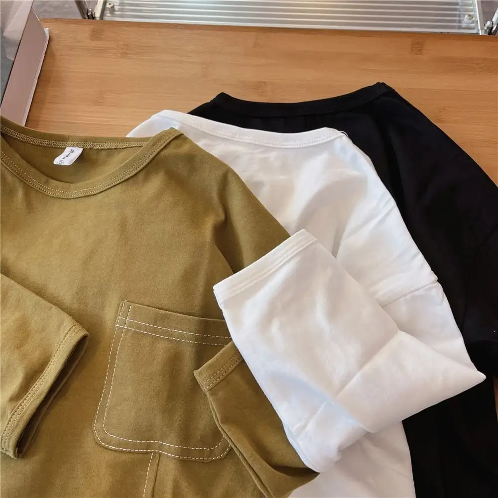 【90-130】春新作ステッチデザイン裾スリット長袖Ｔシャツ