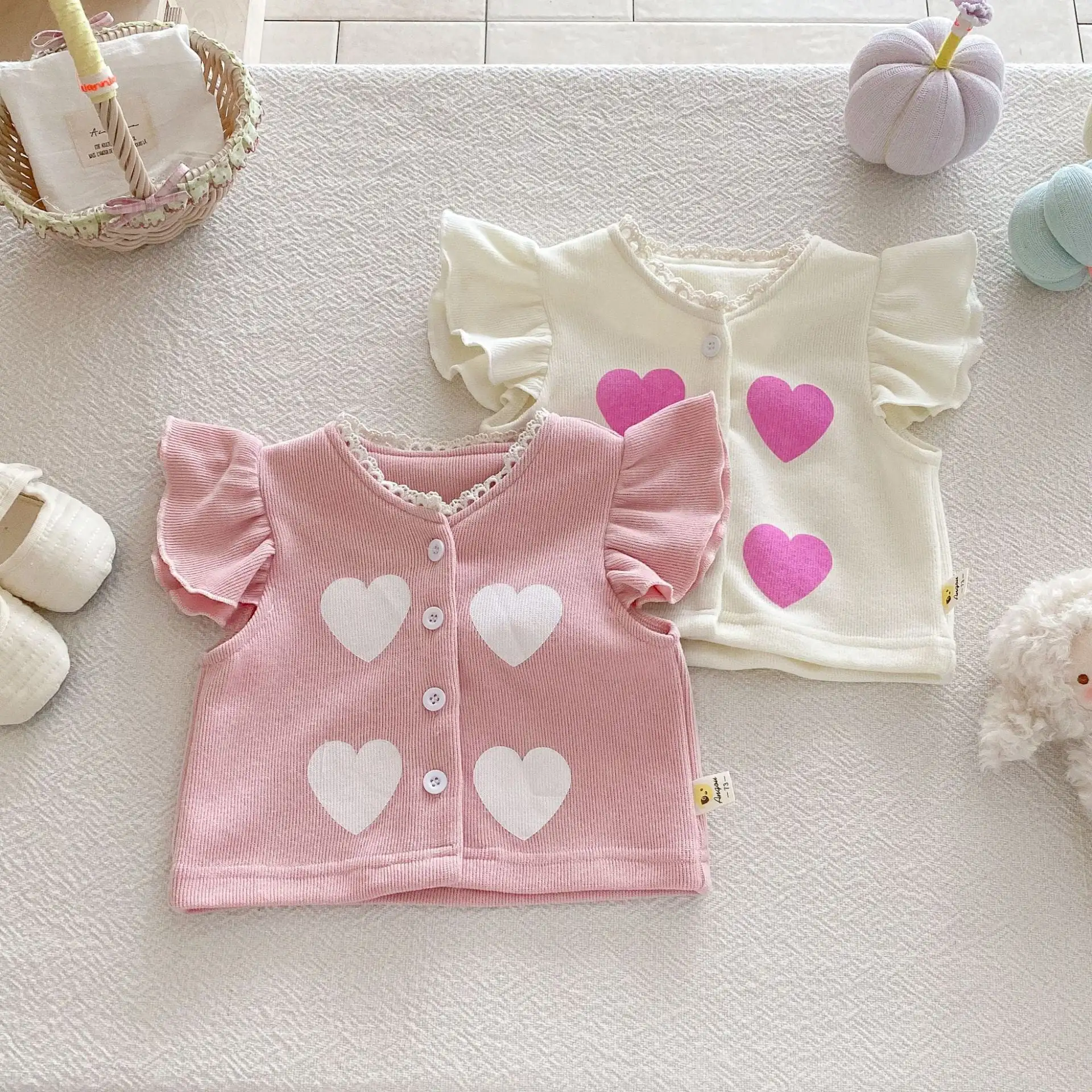 【66-100cm】可愛いフリルハートベスト