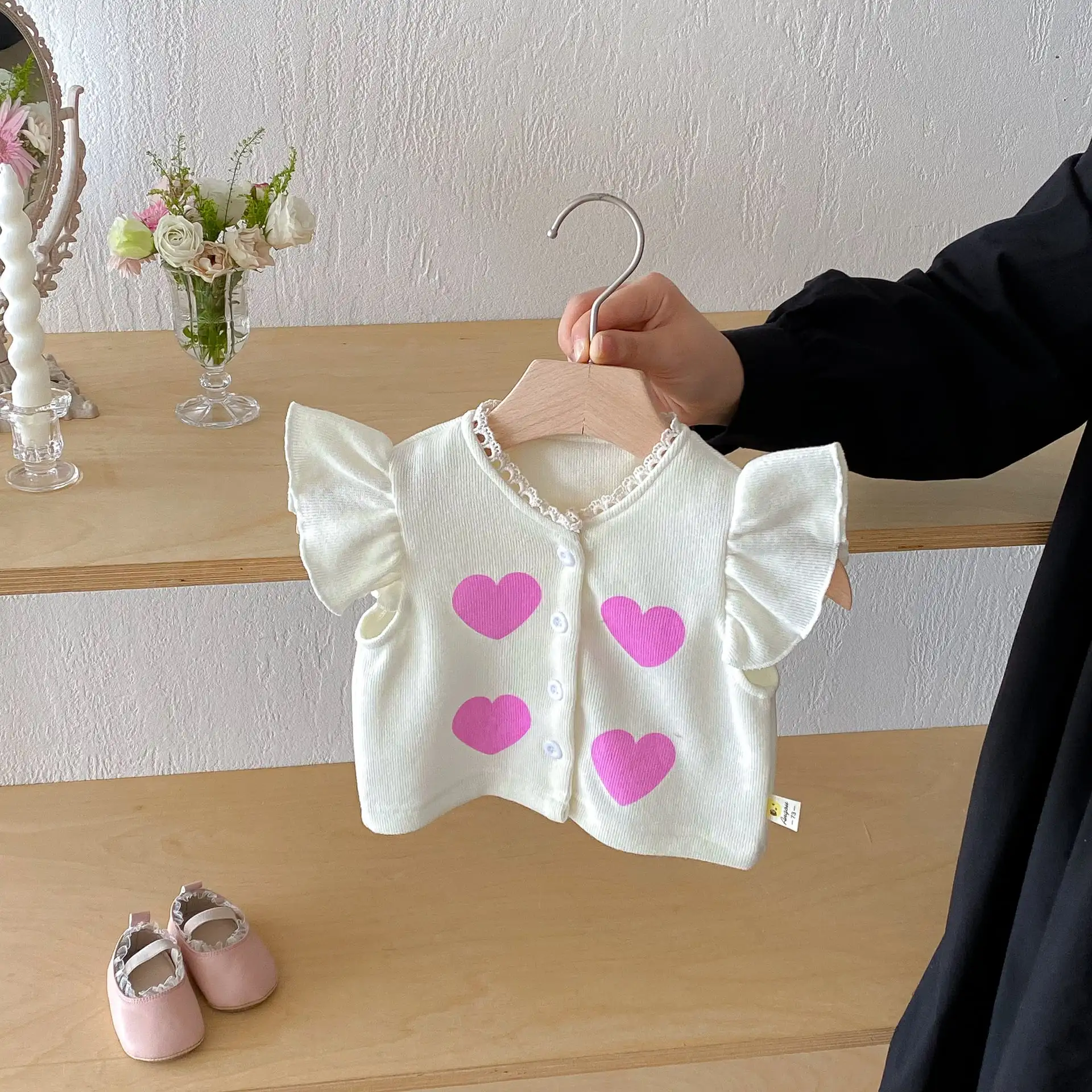 【66-100cm】可愛いフリルハートベスト