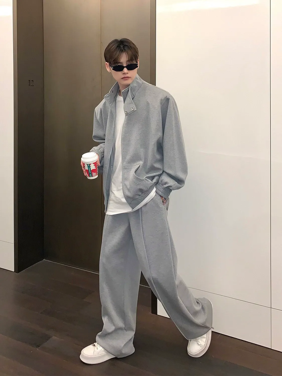 セットアップ デザイン感 カジュアル スタンドネック アウター+ルーズ 長ズボン