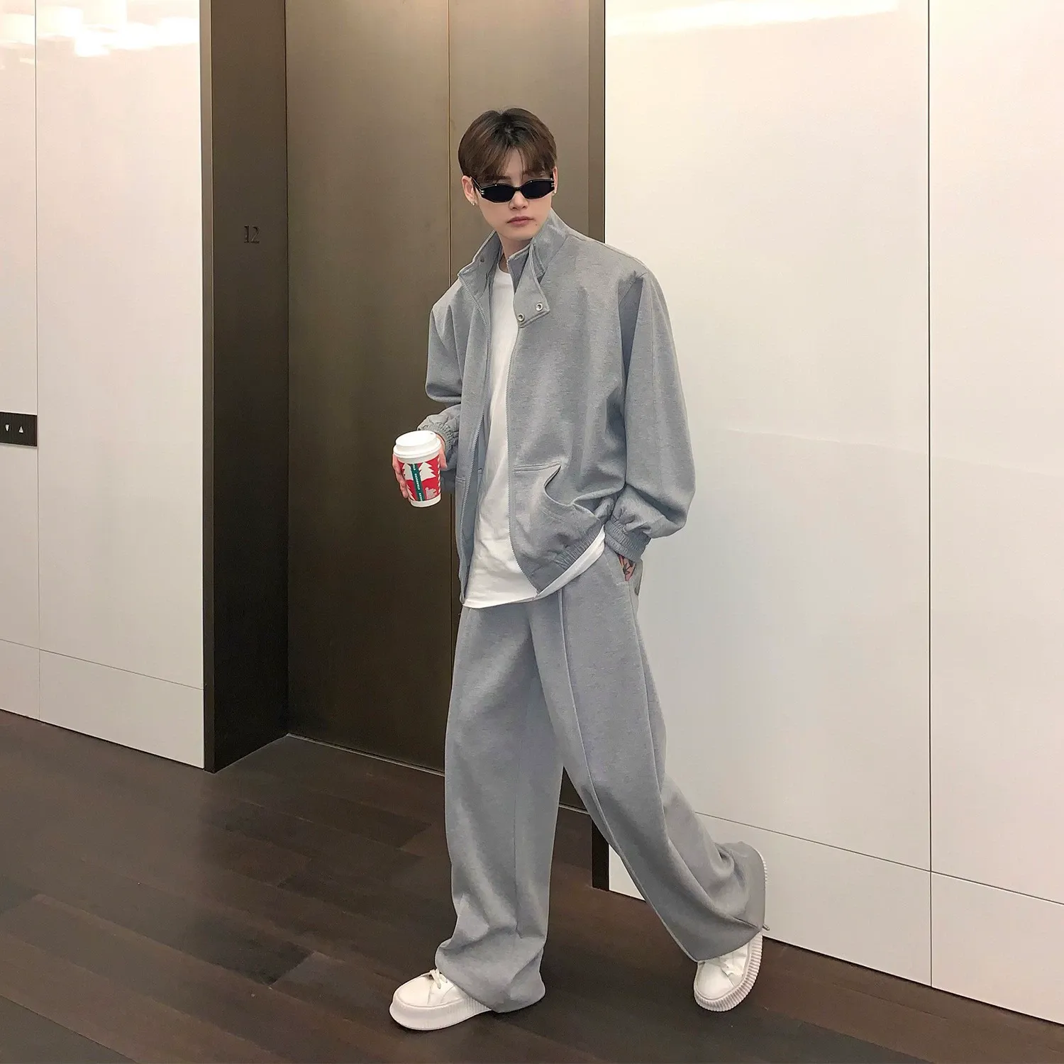 セットアップ デザイン感 カジュアル スタンドネック アウター+ルーズ 長ズボン