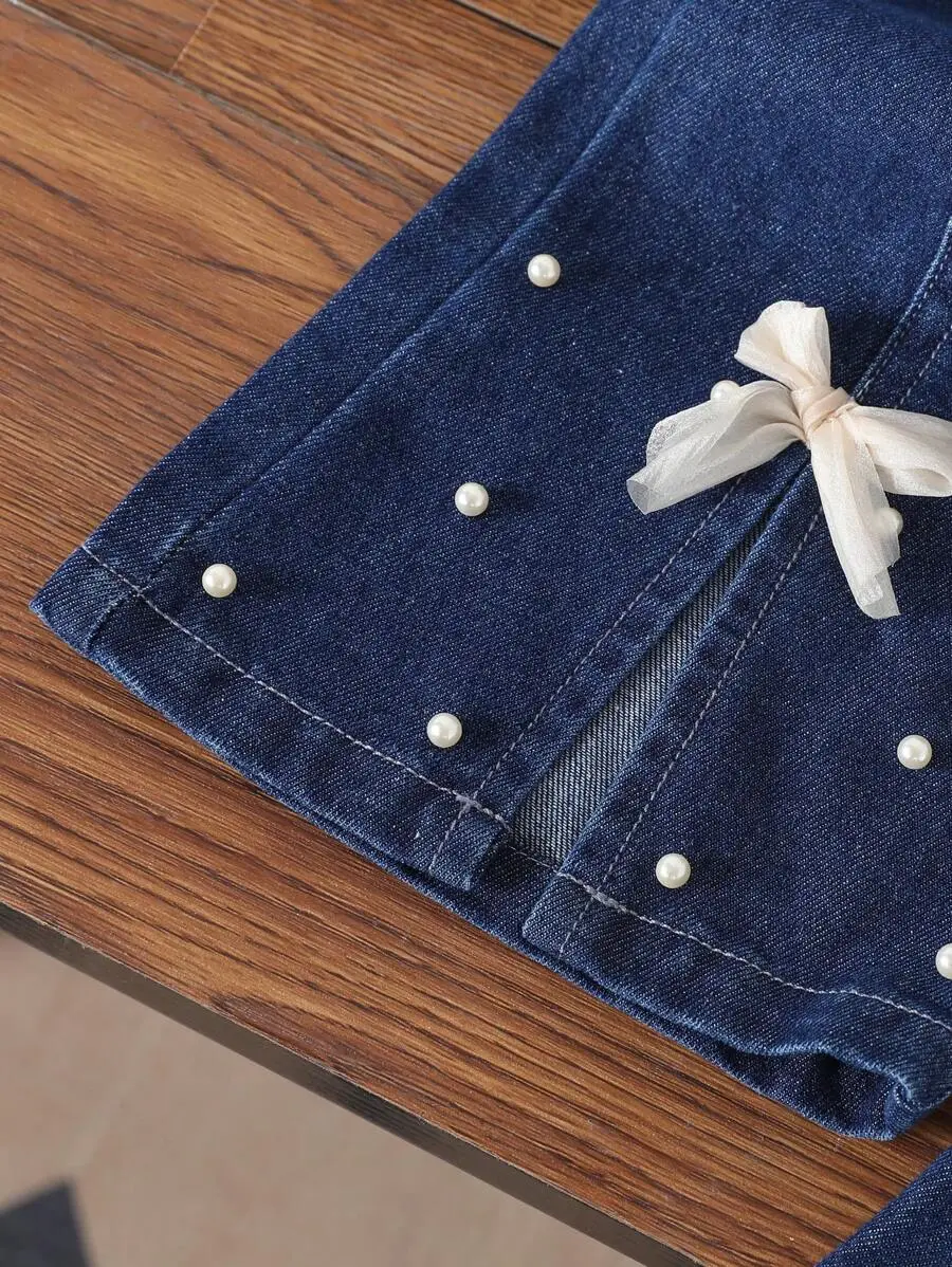 ファッション フェイクパール リボン デニム フレアジーンズ